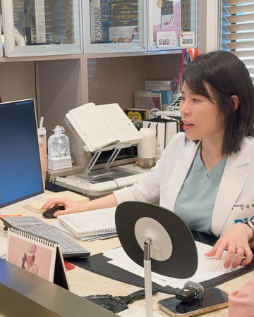 Dr. Yu Hyemi at Bio Plastic Surgery is checking the information from the monitor.